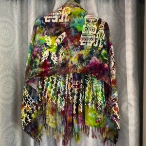 Multi colored, tribal print scarf/sarong. Very versatile and pretty. One size